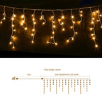 32m 960-LED Solar Christmas Icicle Roofline Lights Warm White - Illuminated Night-Time Outdoor Display View