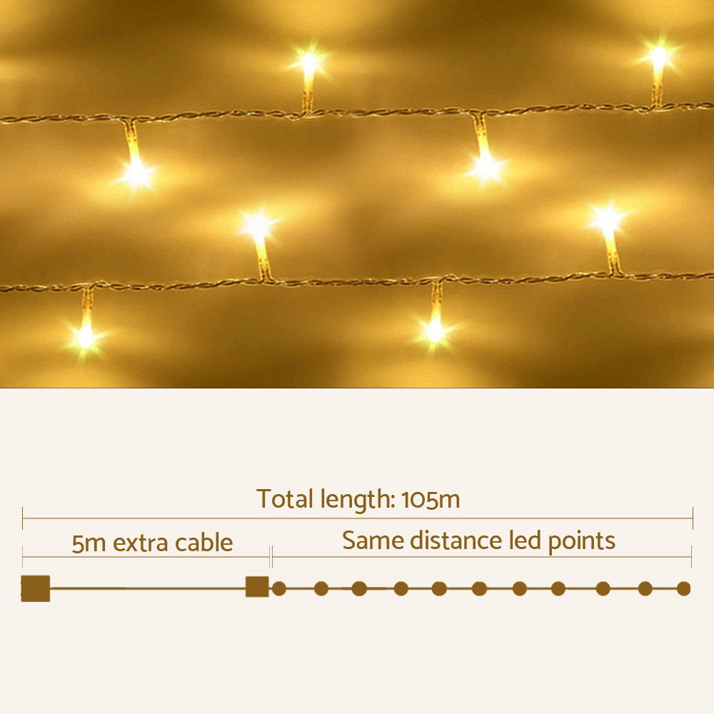 100m 500-LED Warm White Outdoor Christmas Fairy String Lights - Illuminated Night-Time Outdoor Display View
